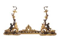 Three Rococo Style Gilt and Patinated Bronze Fireplace Articles