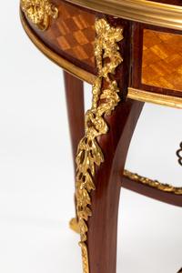 A Louis XV Style Gilt Bronze Mounted Marquetry Table