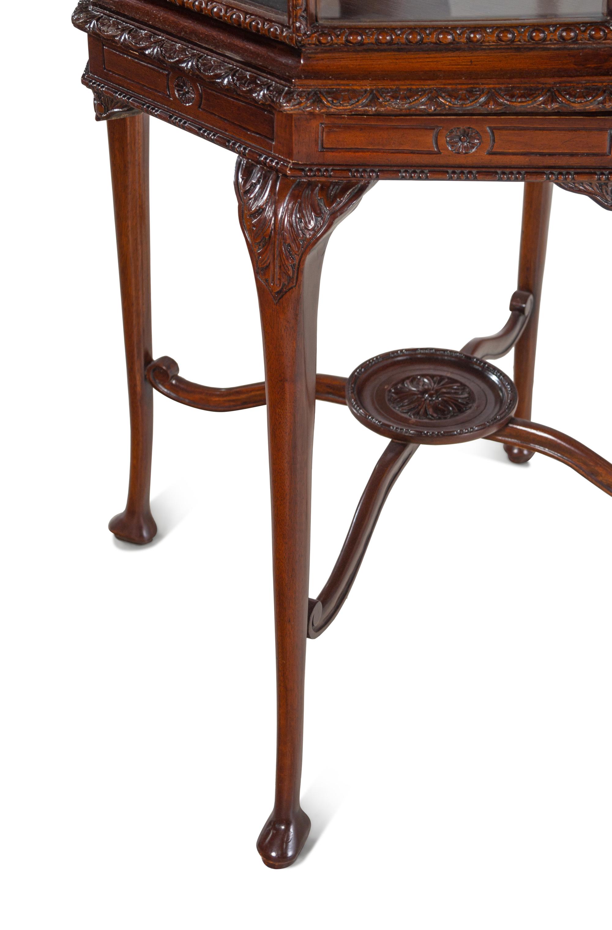 A George III Style Carved Mahogany Octagonal Vitrine