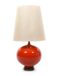 A Red Ceramic and Wood Table Lamp Height 41 inches. — MID 20TH CENTURY