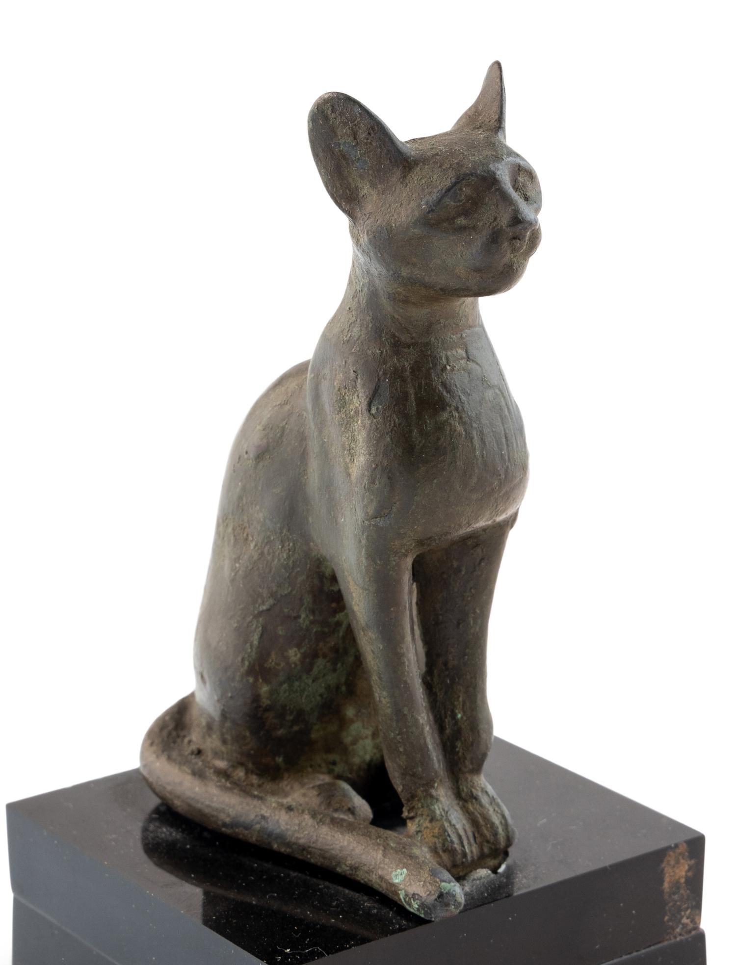 An Egyptian Bronze Seated Cat