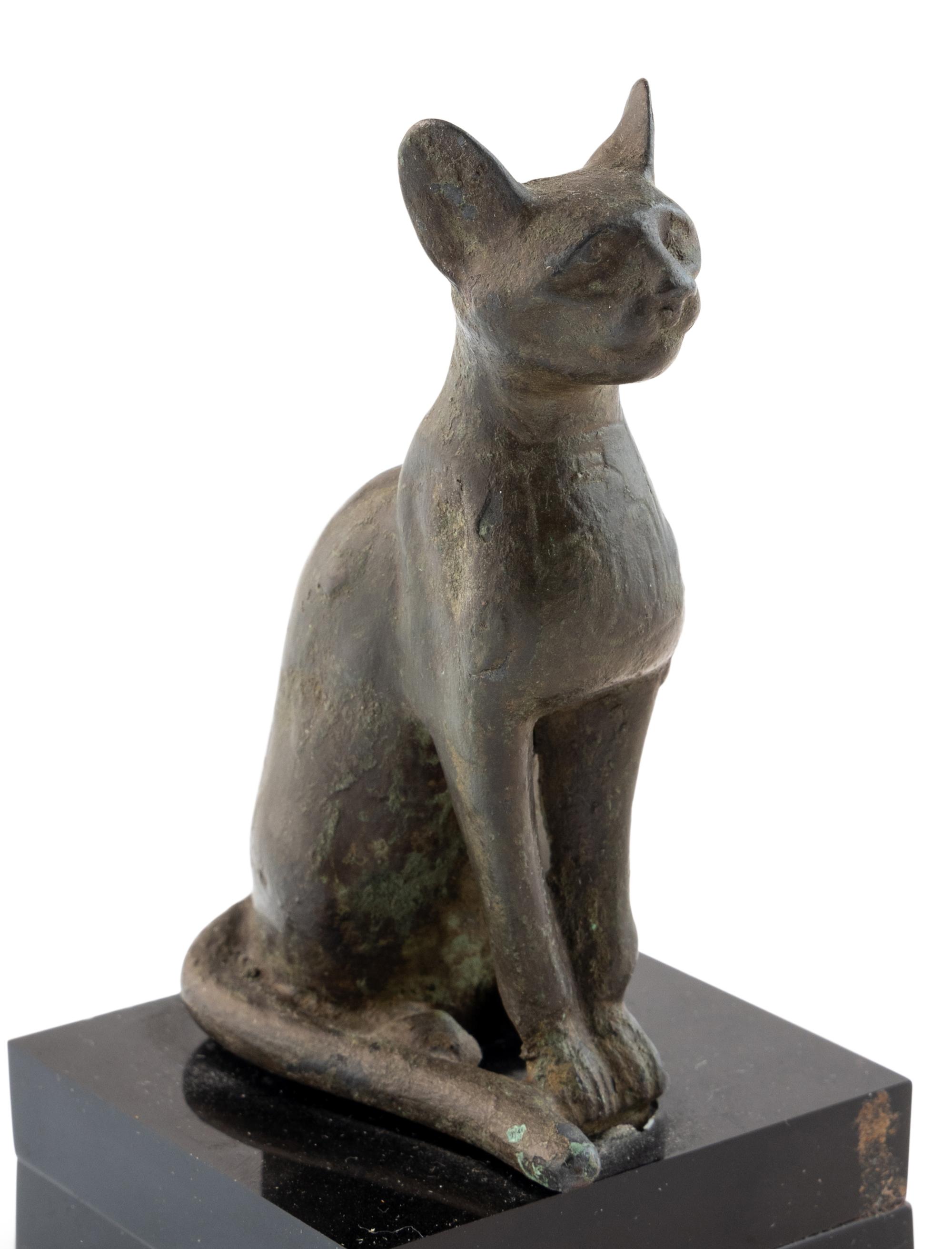 An Egyptian Bronze Seated Cat