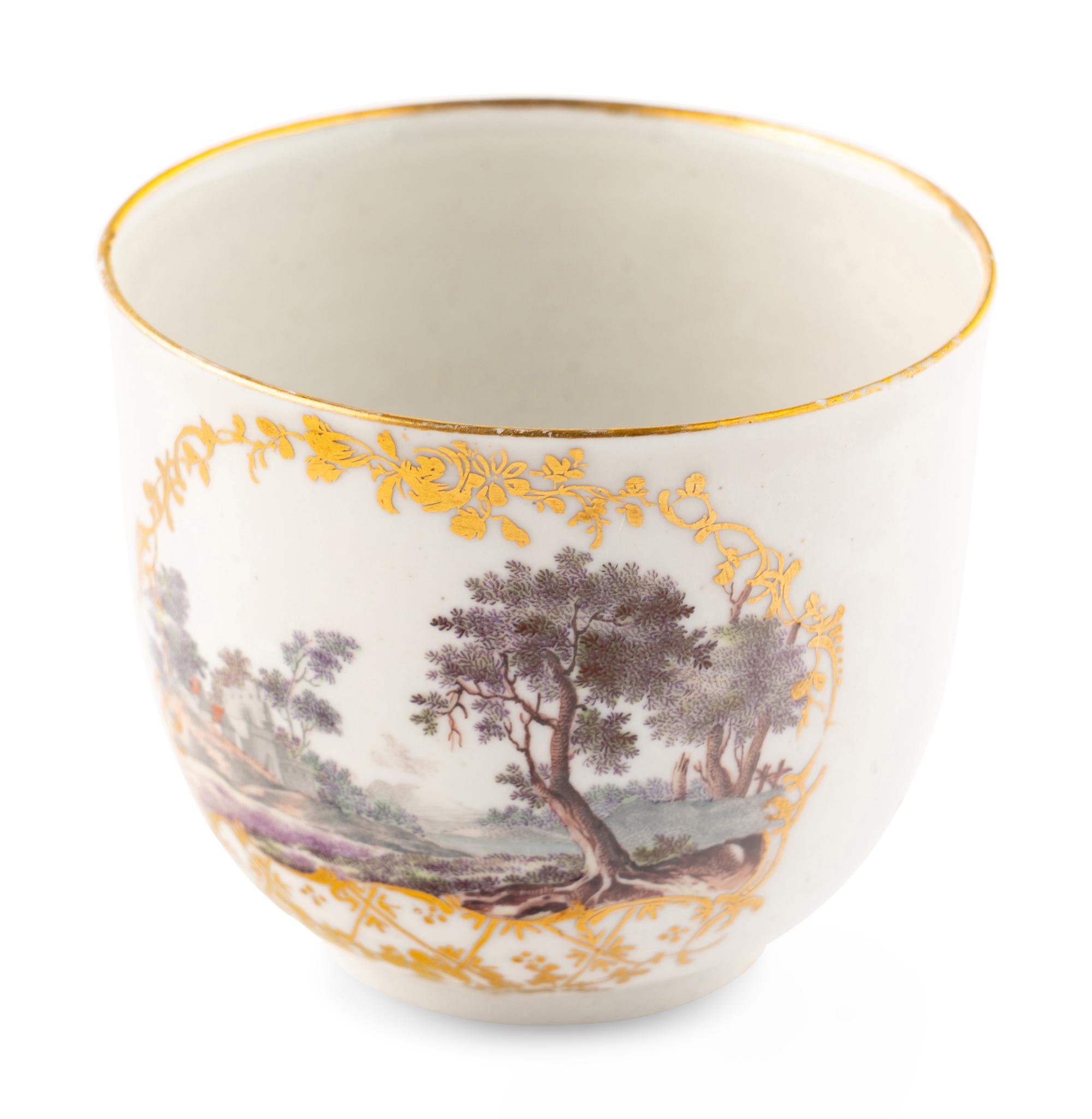 A Near Pair of South Italian Porcelain Teacups and Saucers