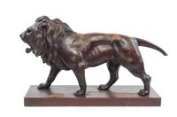 A Continental Carved Mahogany Figure Length 29 inches. — 19TH CENTURY