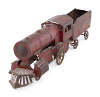 A Group of Five Metal Toys