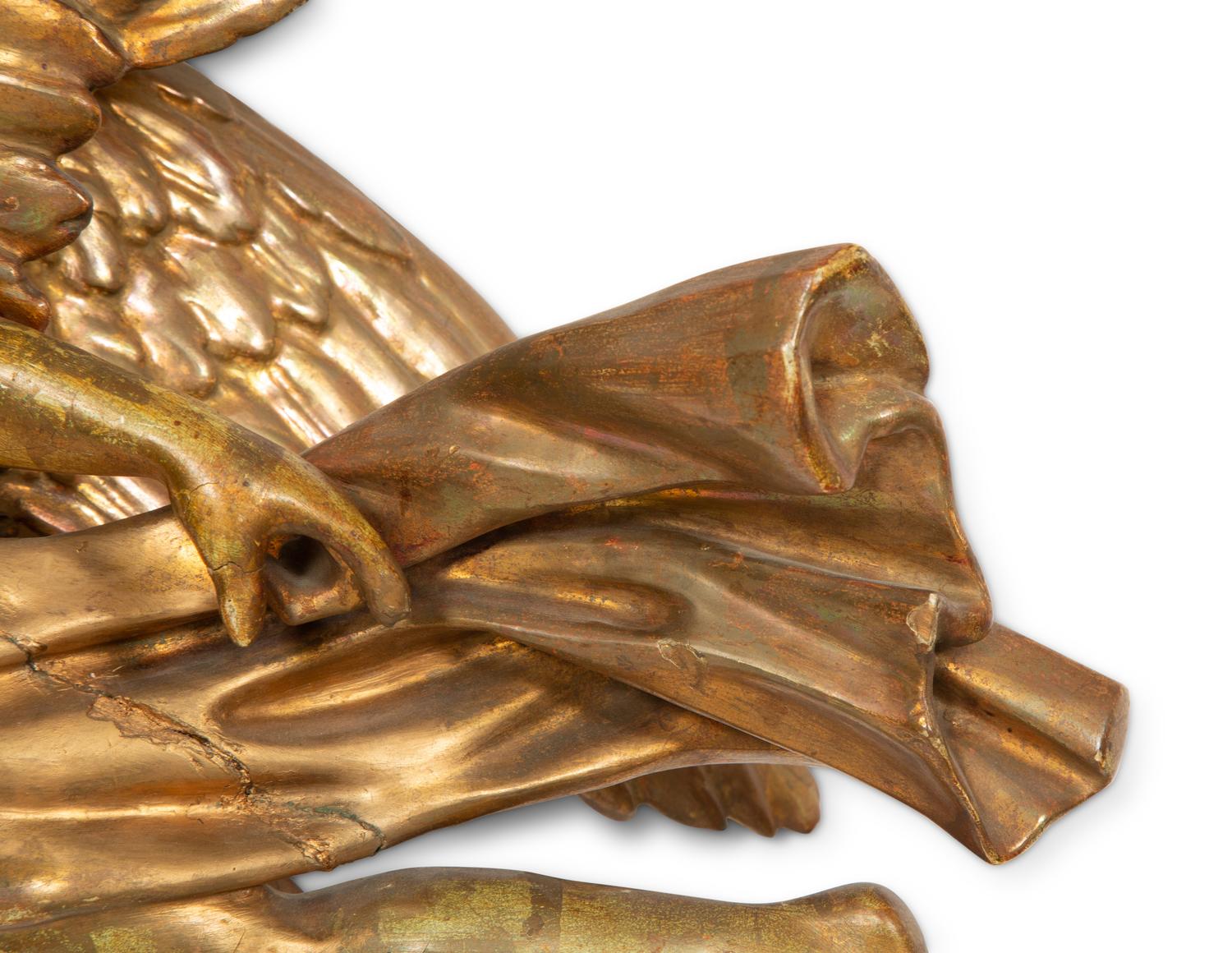 A Pair of Italian Carved Giltwood Winged Angel Appliqués