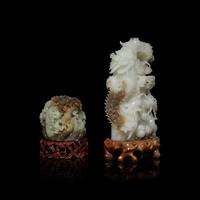 Two Chinese Pale Celadon and Russet Jade Carvings, 20th Century 近代 青白玉擺件兩種