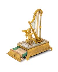 A Palais Royal Gilt Musical Ring Stand