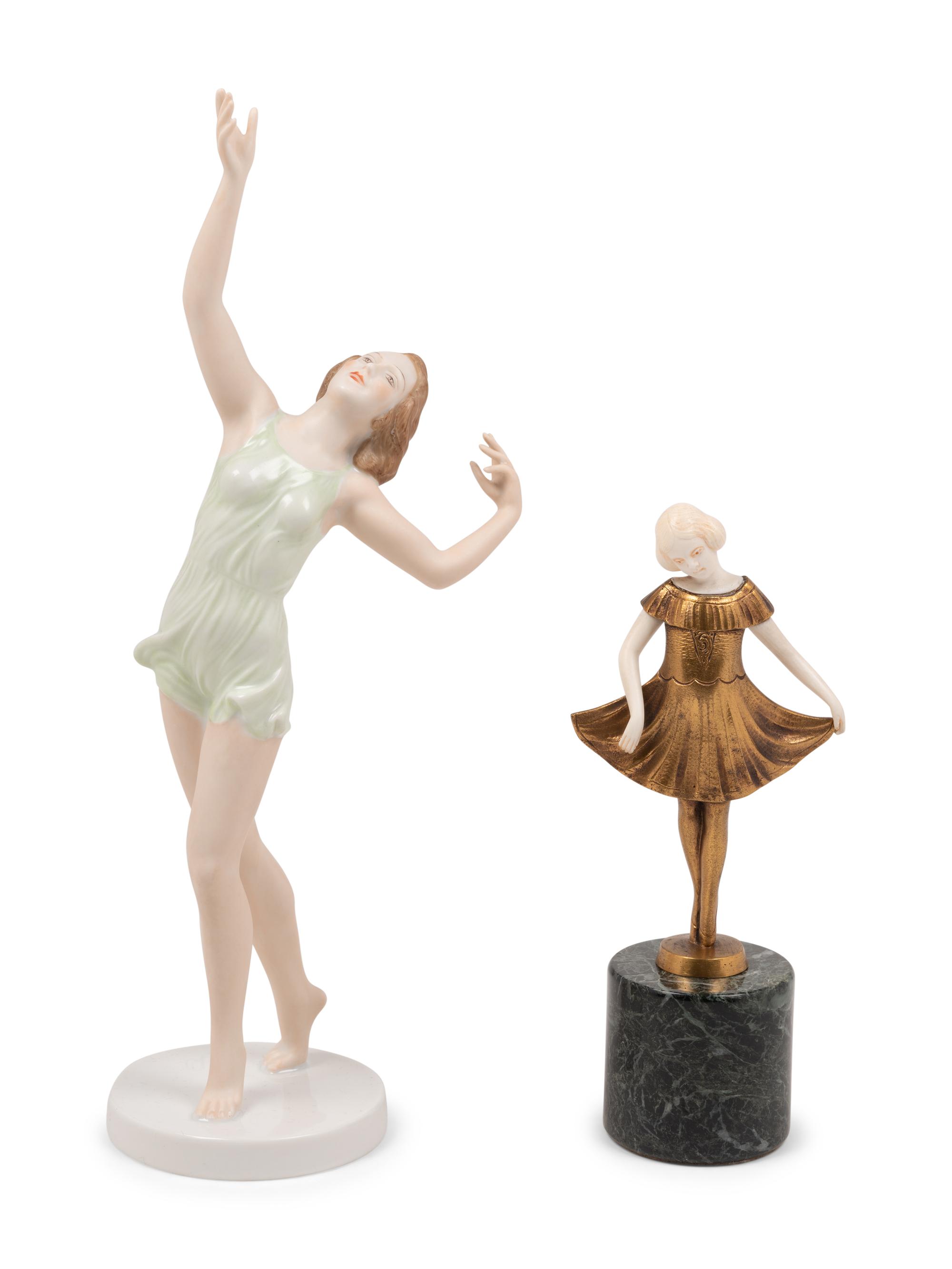 An Assortment of Porcelain and Bronze Figures