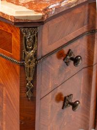 A Pair of Late Louis XV Style Gilt Bronze Mounted Marquetry Marble-Top Commodes