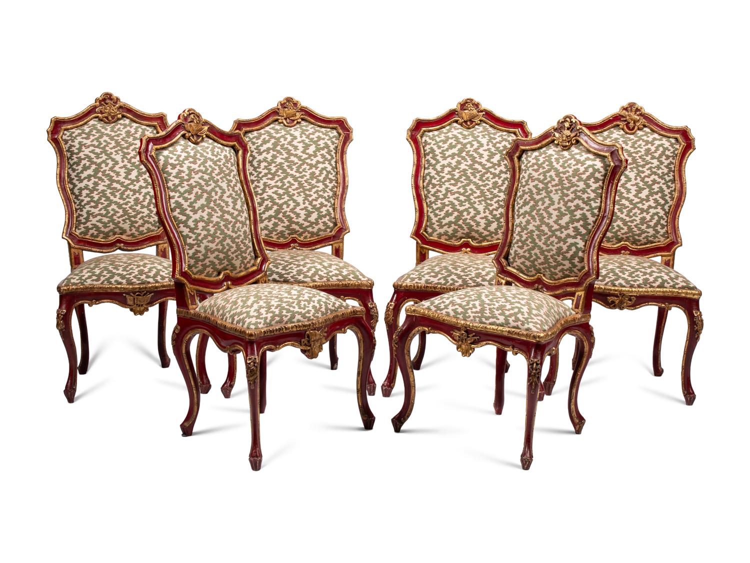 A Set of Six Italian Rococo Red-Painted and Parcel Gilt Dining Chairs