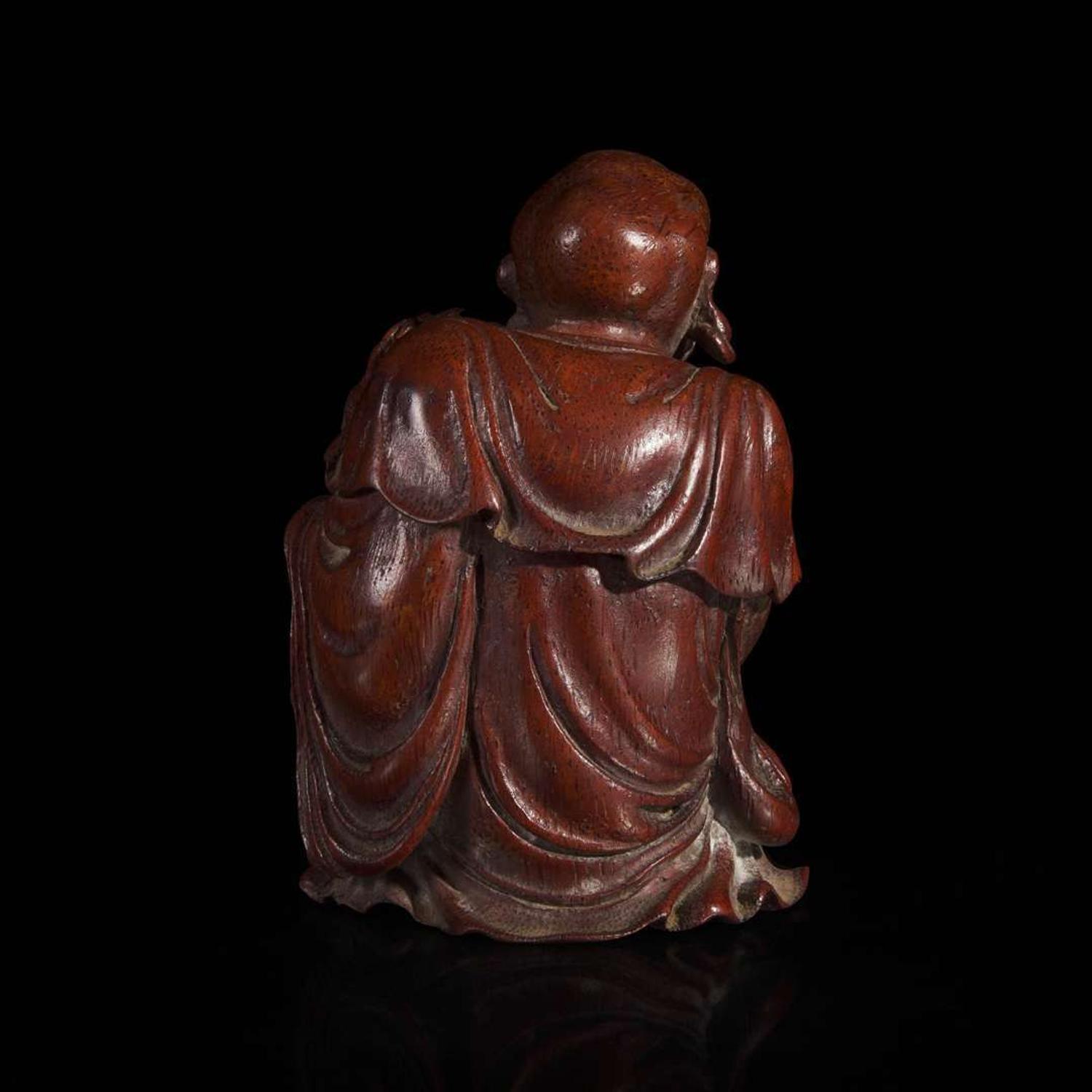 A Chinese finely-carved bamboo luohan and lion 竹雕笑狮罗汉 Qing dynasty ?