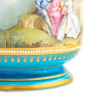 A Pair of Sèvres Style Porcelain Cache Pots