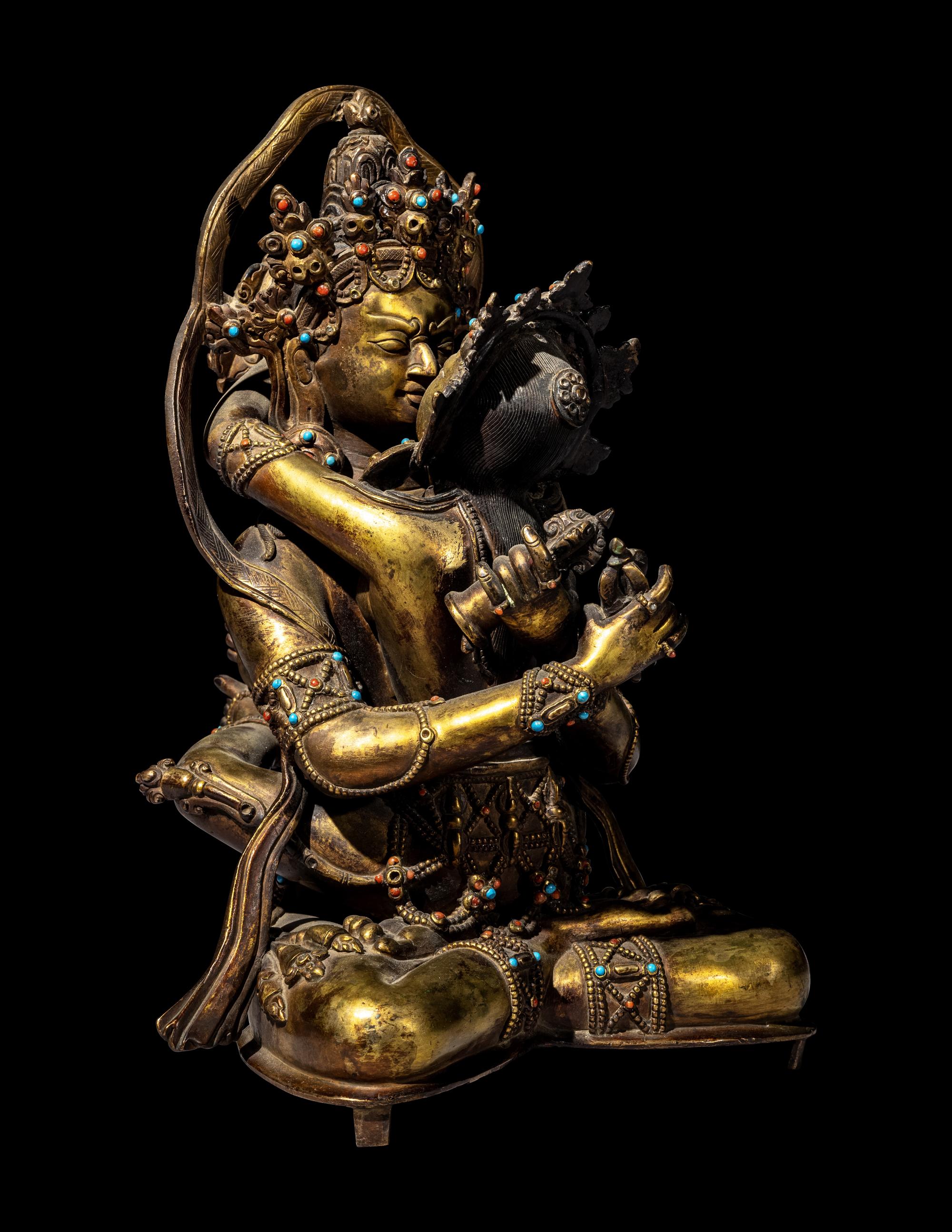 A Sino-Tibetan Hardstone Inset Gilt Bronze Figure of a Seated Bodhisattva and Consort