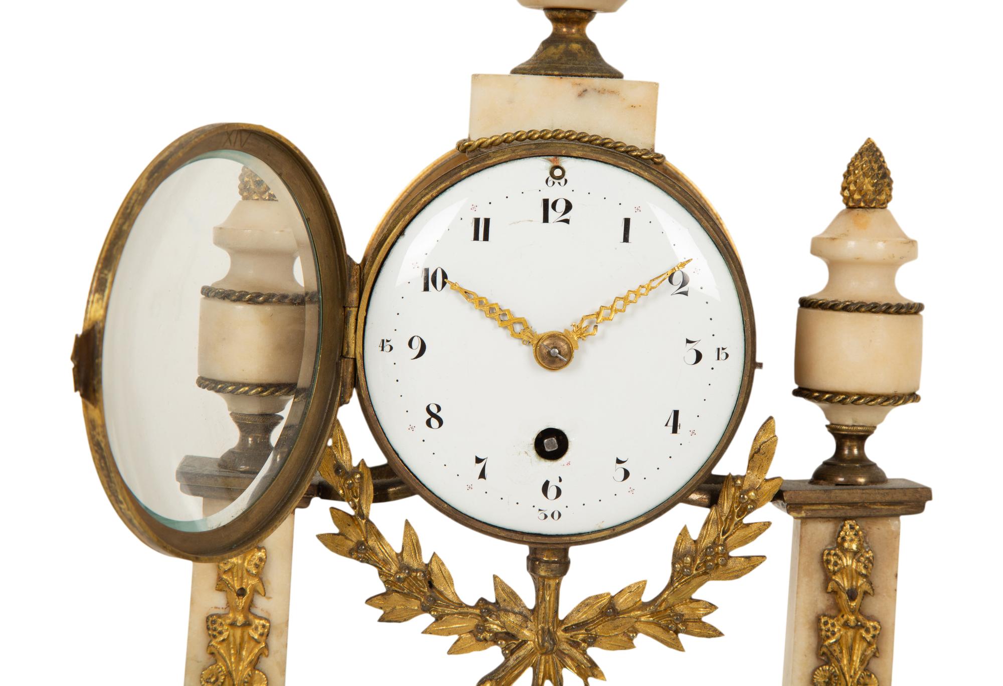 A Neoclassical White Marble and Gilt Bronze Portico Clock