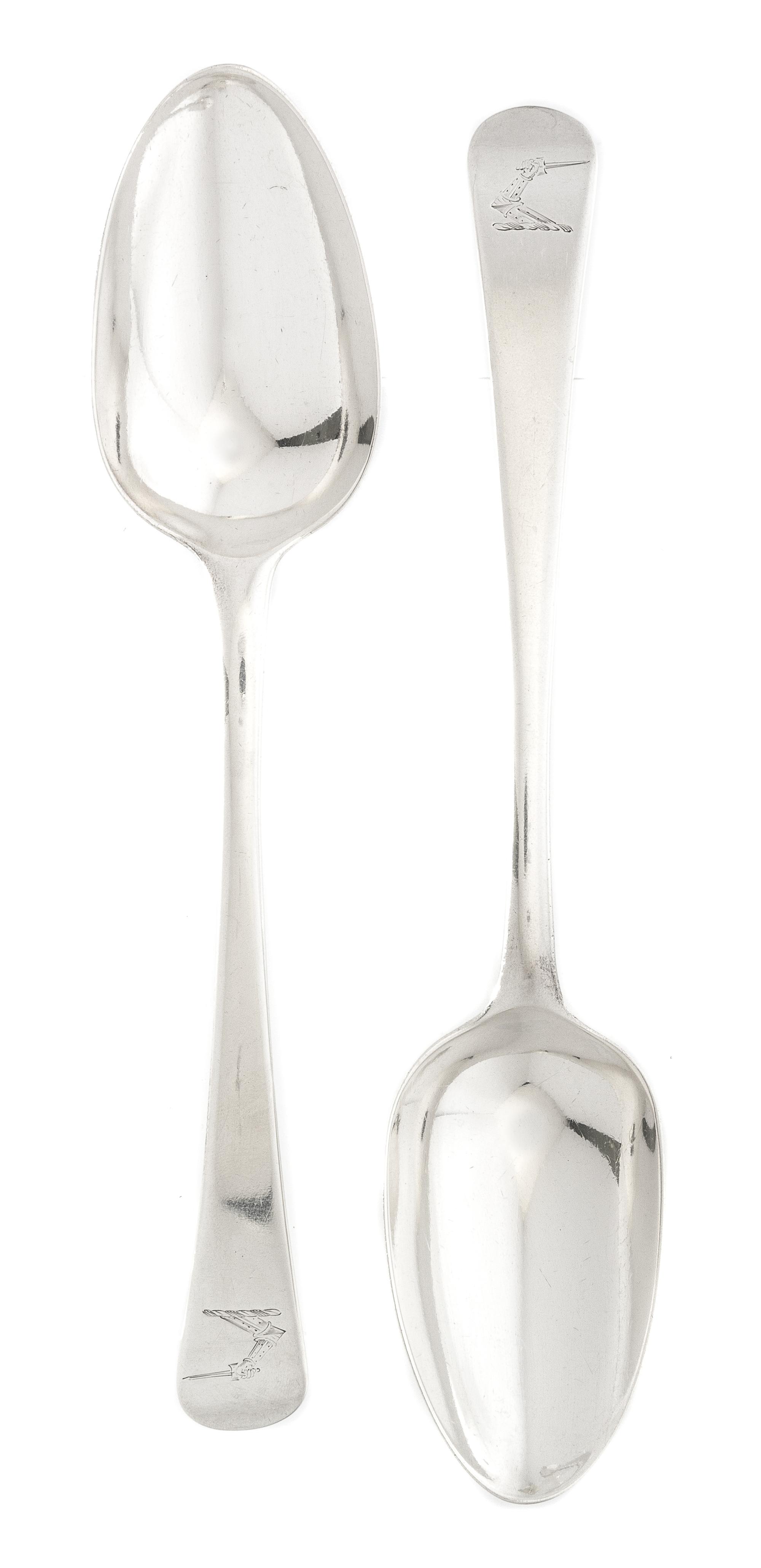 A Pair of George III Silver Tablespoons, possibly Jas. Stamp, London, 1778, the handle with an engraved crest of an arm embowed with ar