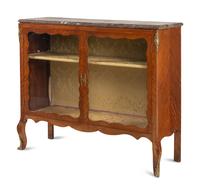 A Louis XV Style Gilt Bronze Mounted Bookmatched Mahogany Marble-Top Bookcase