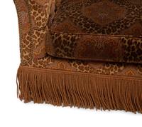 A Chesterfield Style Velvet-Upholstered Sofa with a Fringed Skirt