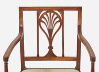 A group of three Federal mahogany racquet-back armchairs, Philadelphia, PA, circa 1790