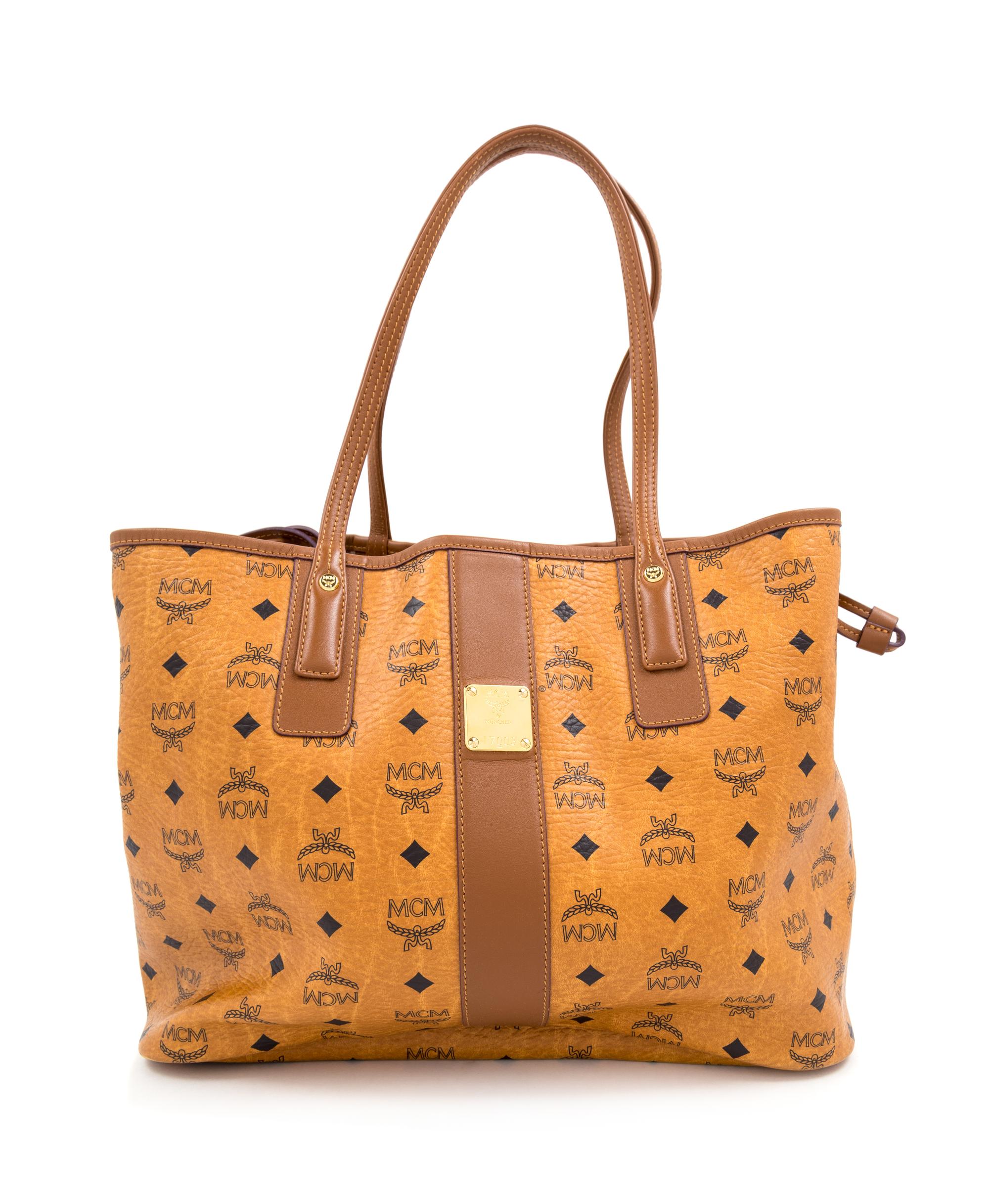 An MCM Cognac Reversible Liz Visetos Shopper Tote, 12" H x 13" W x 6" D; Strap drop: 8.75".