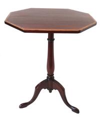 A Diminutive Mahogany Tilt-Top Table Height 22 1/2 inches.