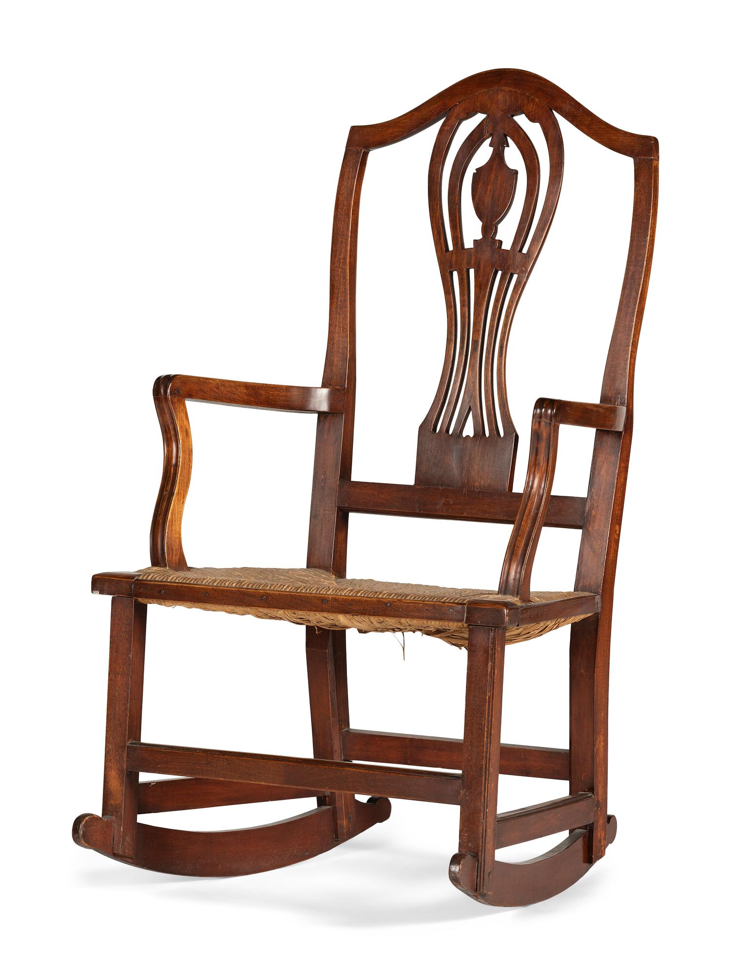 A Federal Heart and Urn Carved Mahogany Rush-Seat Rocking Chair