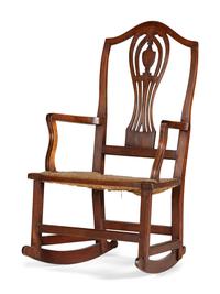 A Federal Heart and Urn Carved Mahogany Rush-Seat Rocking Chair