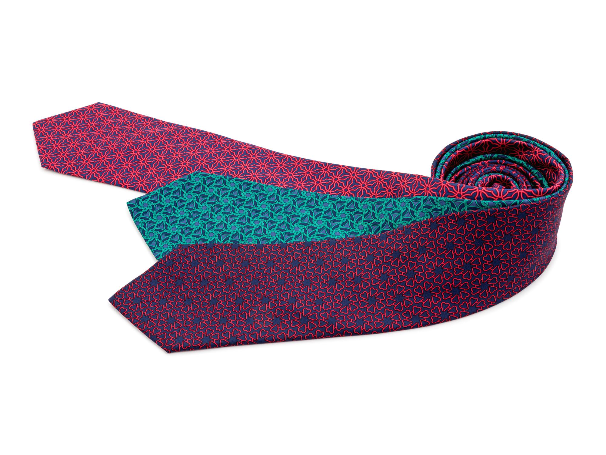 Three Hermes ties, two blue, one green