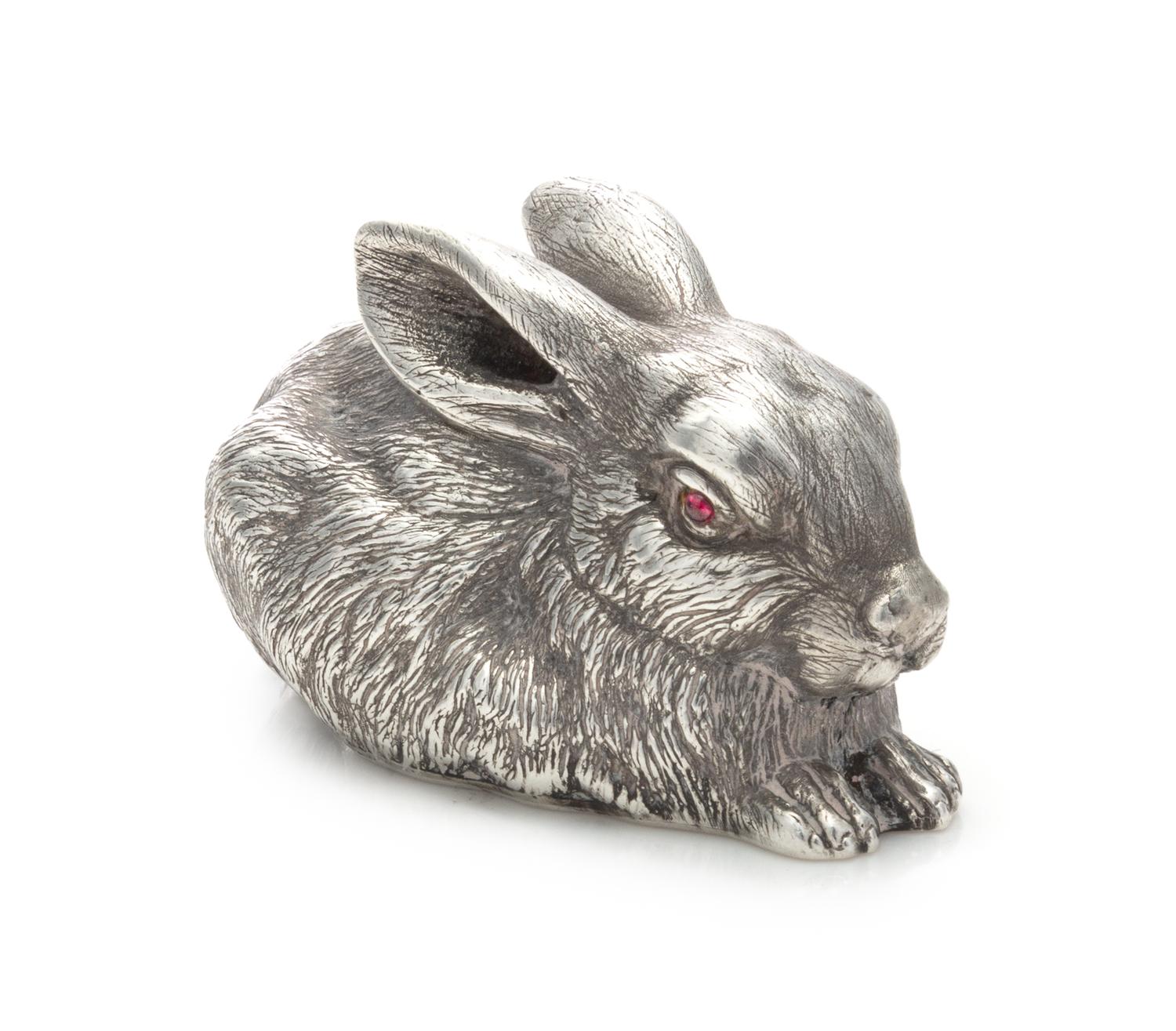 A Russian Silver Table Ornament, Maker's Mark Latin I.P., St. Petersburg, Early 20th Century, in the form of a rabbit with cabochon ins