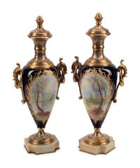 A Pair of Gilt Bronze Mounted Sèvres Style Porcelain, Onyx and Champlevé Urns