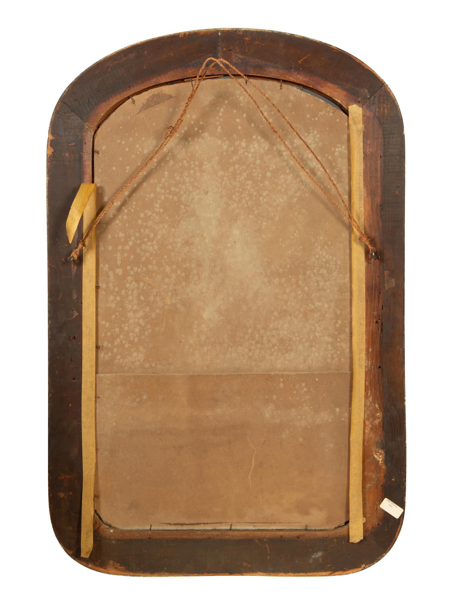 A Victorian Ebonized and Parcel Gilt Mirror