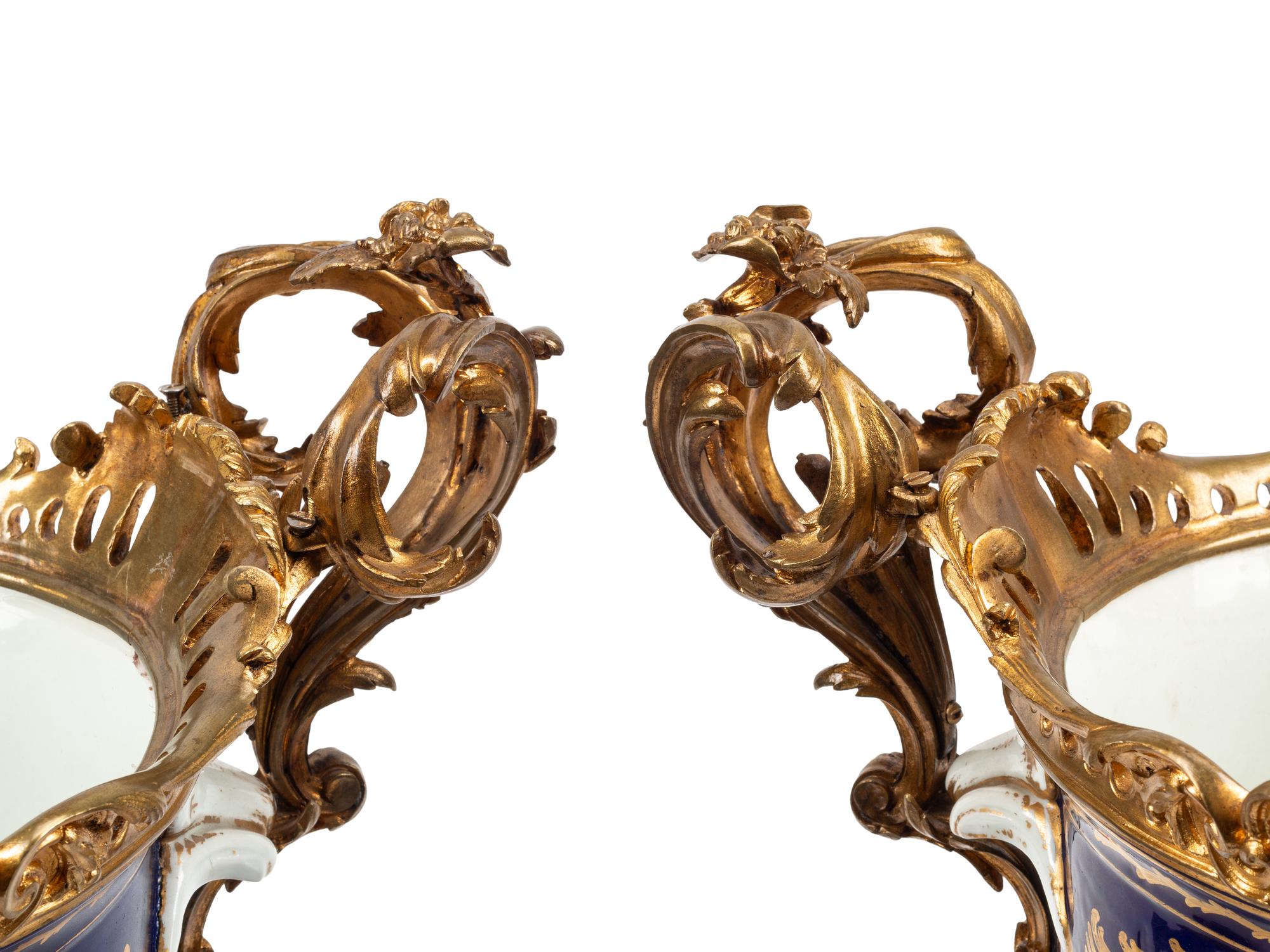 A Pair of Gilt Bronze Mounted Sèvres Style Porcelain Cache Pots