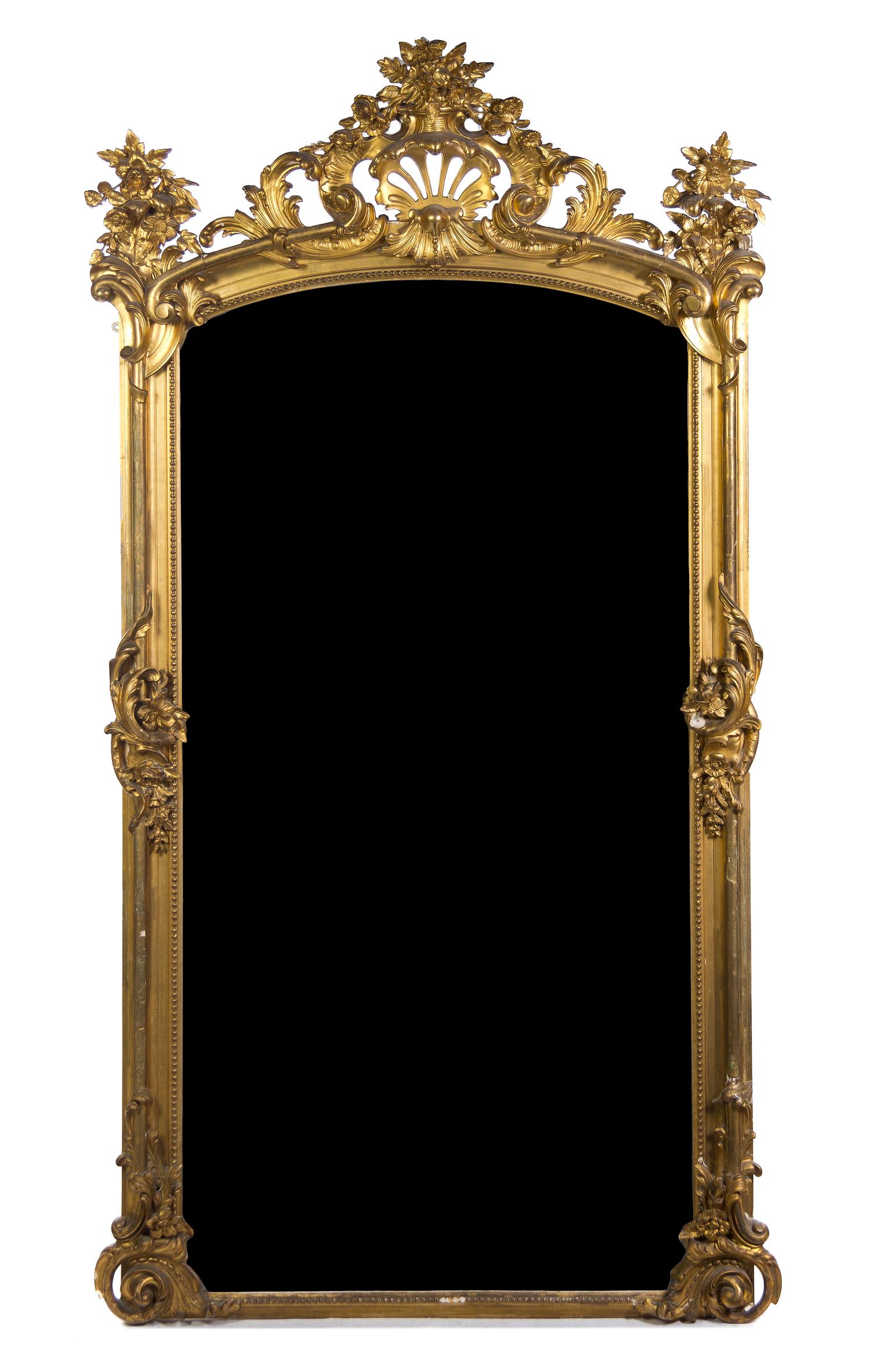 A Rococo Style Giltwood Pier Mirror, Height 98 1/2 x width 52 inches.