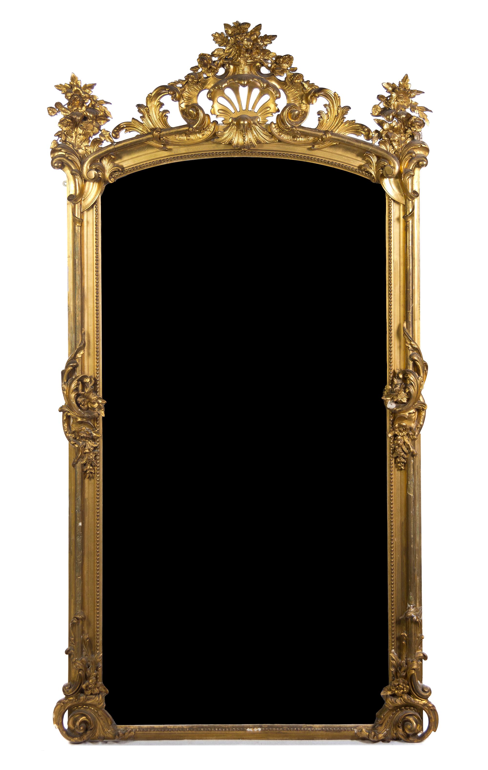 A Rococo Style Giltwood Pier Mirror, Height 98 1/2 x width 52 inches.