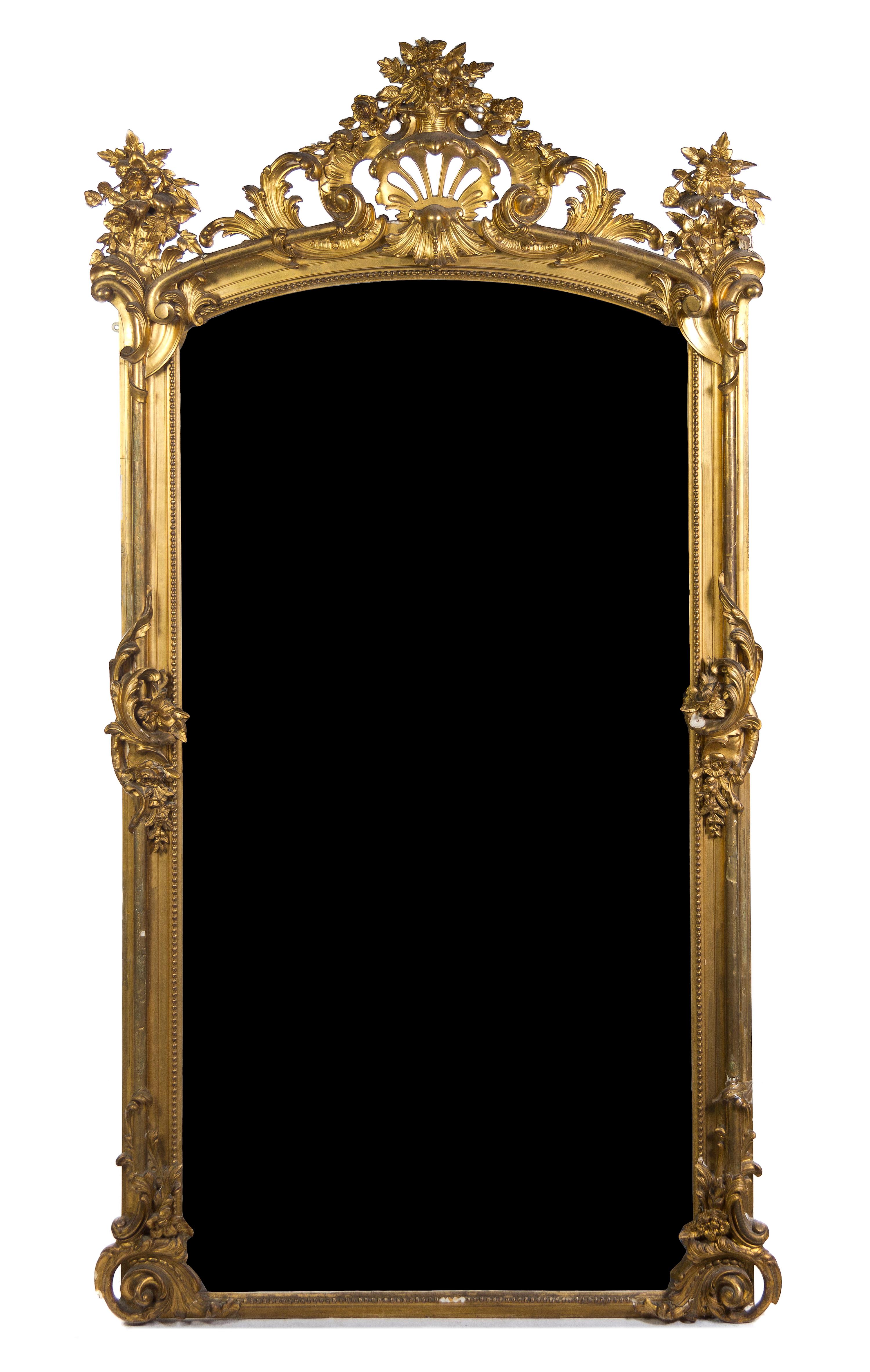 A Rococo Style Giltwood Pier Mirror, Height 98 1/2 x width 52 inches.