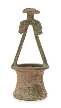 A Chinese Green Glazed Pottery Well Height 16 1/4 inches. — HAN DYNASTY (206 B.C. - A.D. 220)