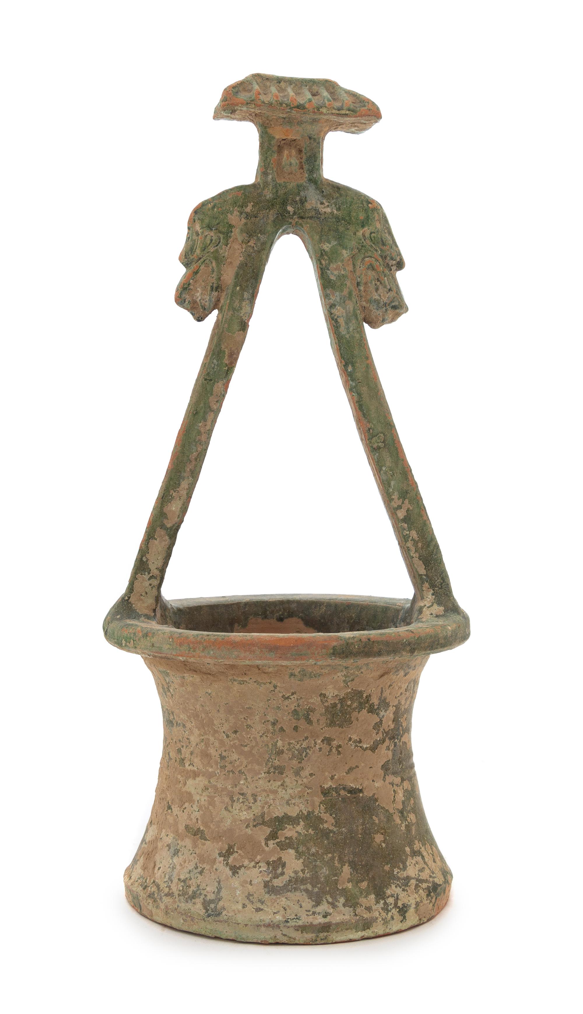 A Chinese Green Glazed Pottery Well Height 16 1/4 inches. — HAN DYNASTY (206 B.C. - A.D. 220)