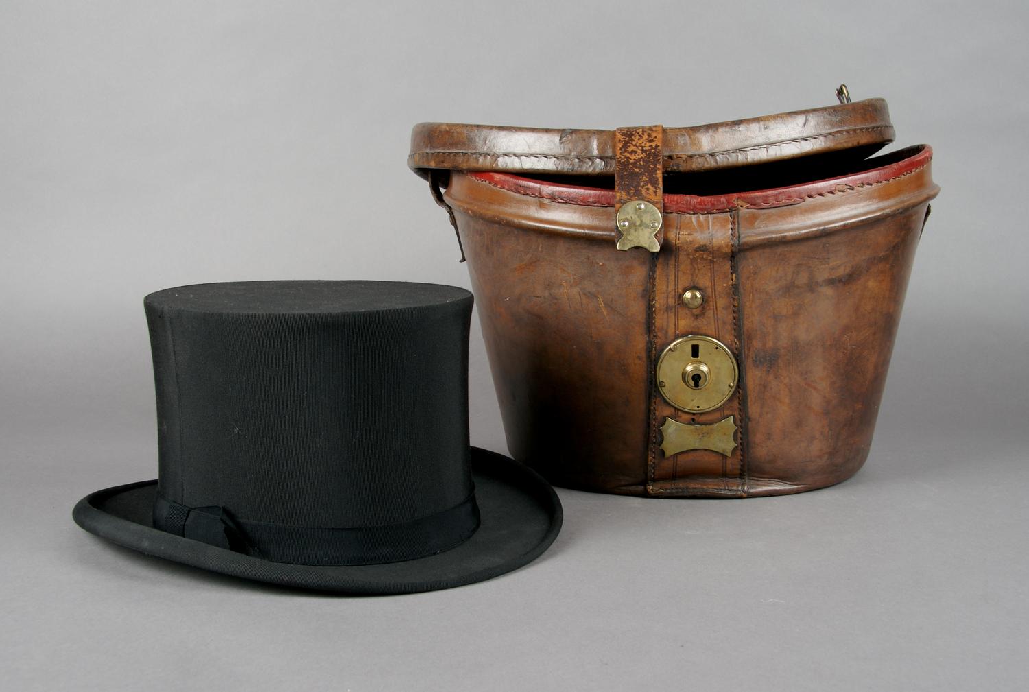 A Leather Hat Box, Height 9 1/2 x width 14 inches.