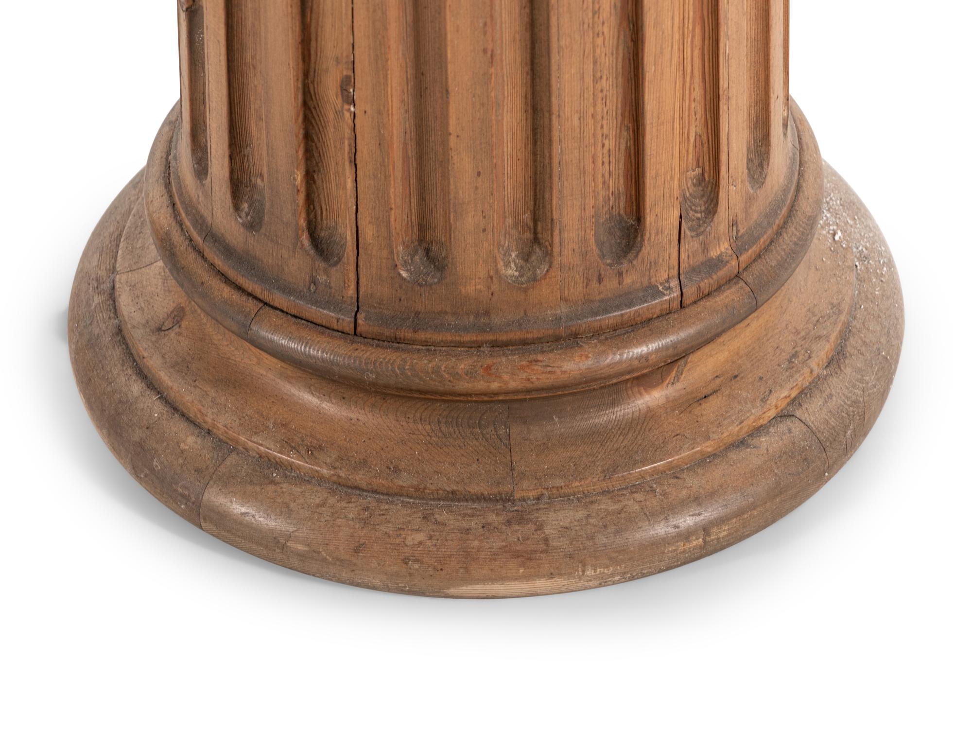A Pair of Carved Pine Pedestals with Marble Tops