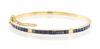 A Yellow Gold, Sapphire and Diamond Bangle Bracelet, 7.60 dwts.
