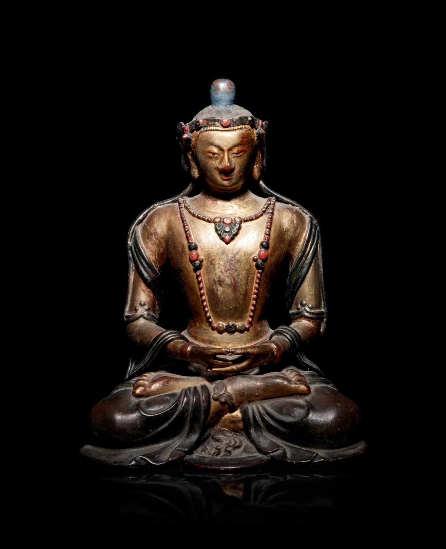 A Mongolian Gilt and Polychrome Painted Wood Figure of Amitayus