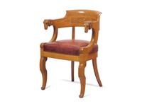 A Charles X Amaranth-Inlaid Golden Oak and Rams' Head Fauteuil