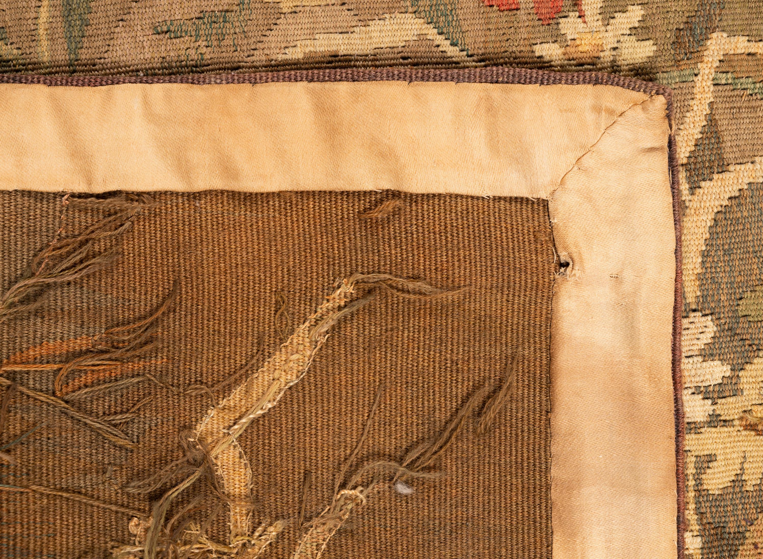 A Continental Wool Verdure Tapestry