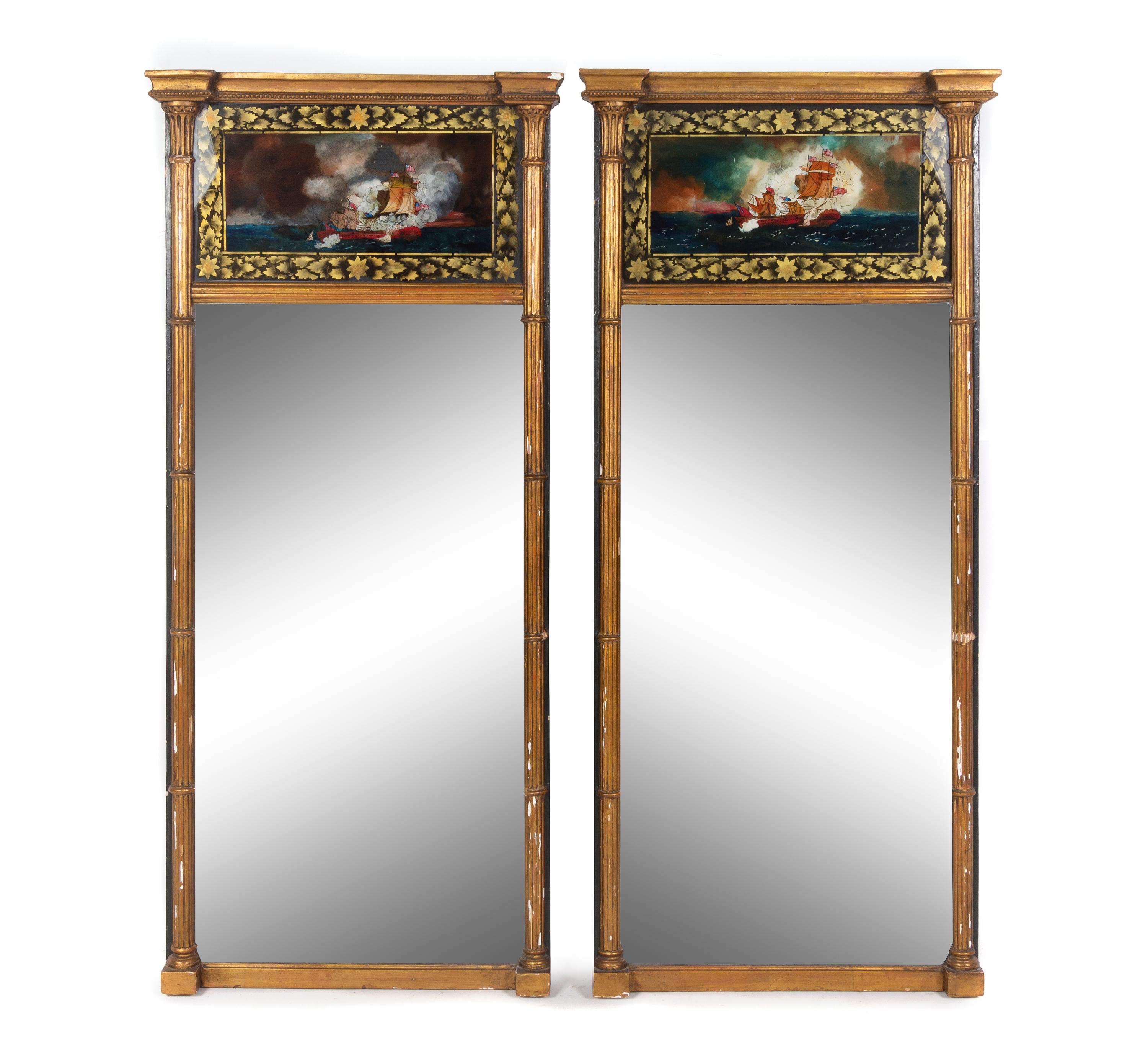 A Pair of Classical Giltwood Églomisé Looking Glasses