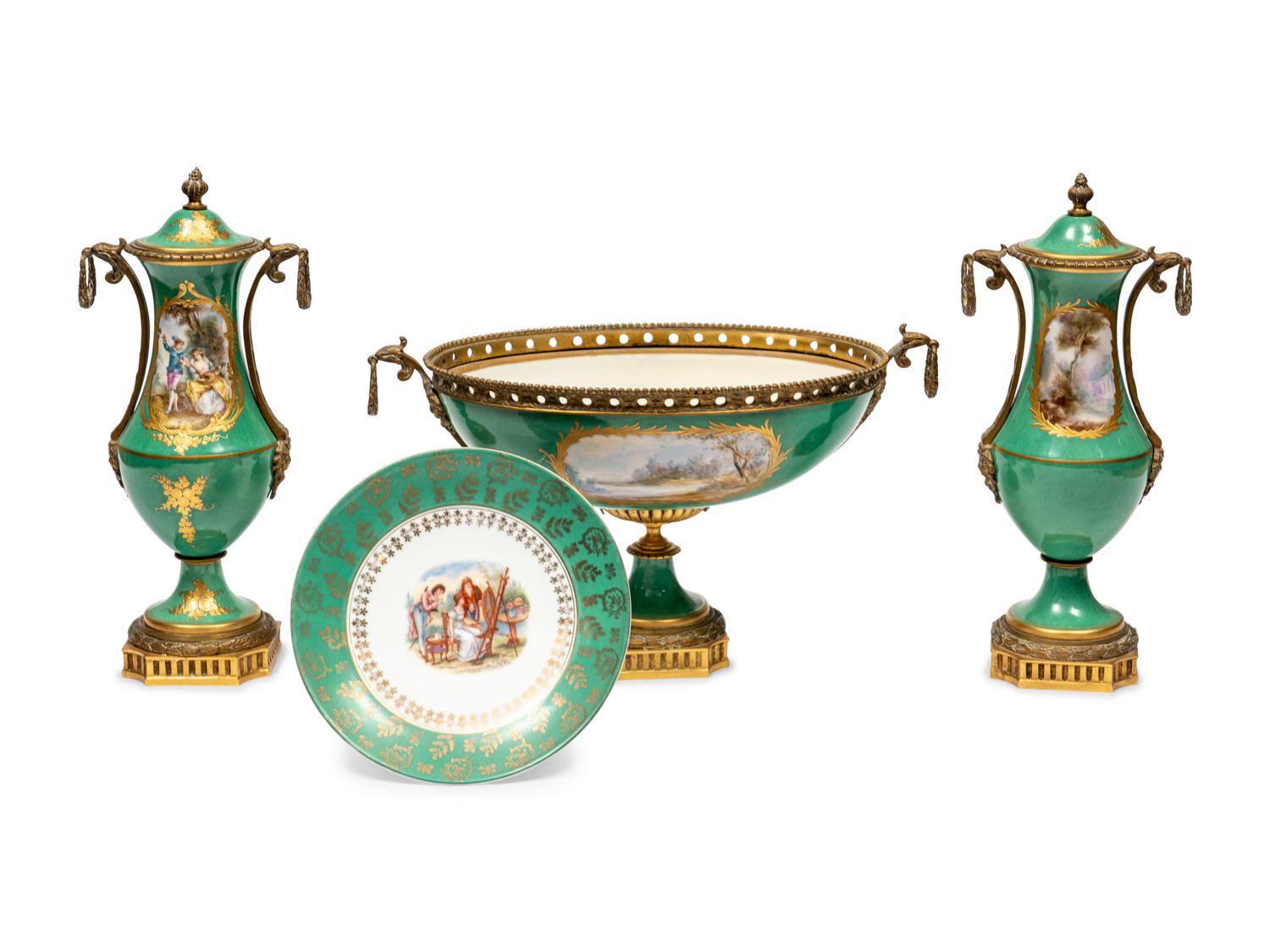 A Gilt Metal Mounted Sèvres Style Porcelain Three-Piece Garniture