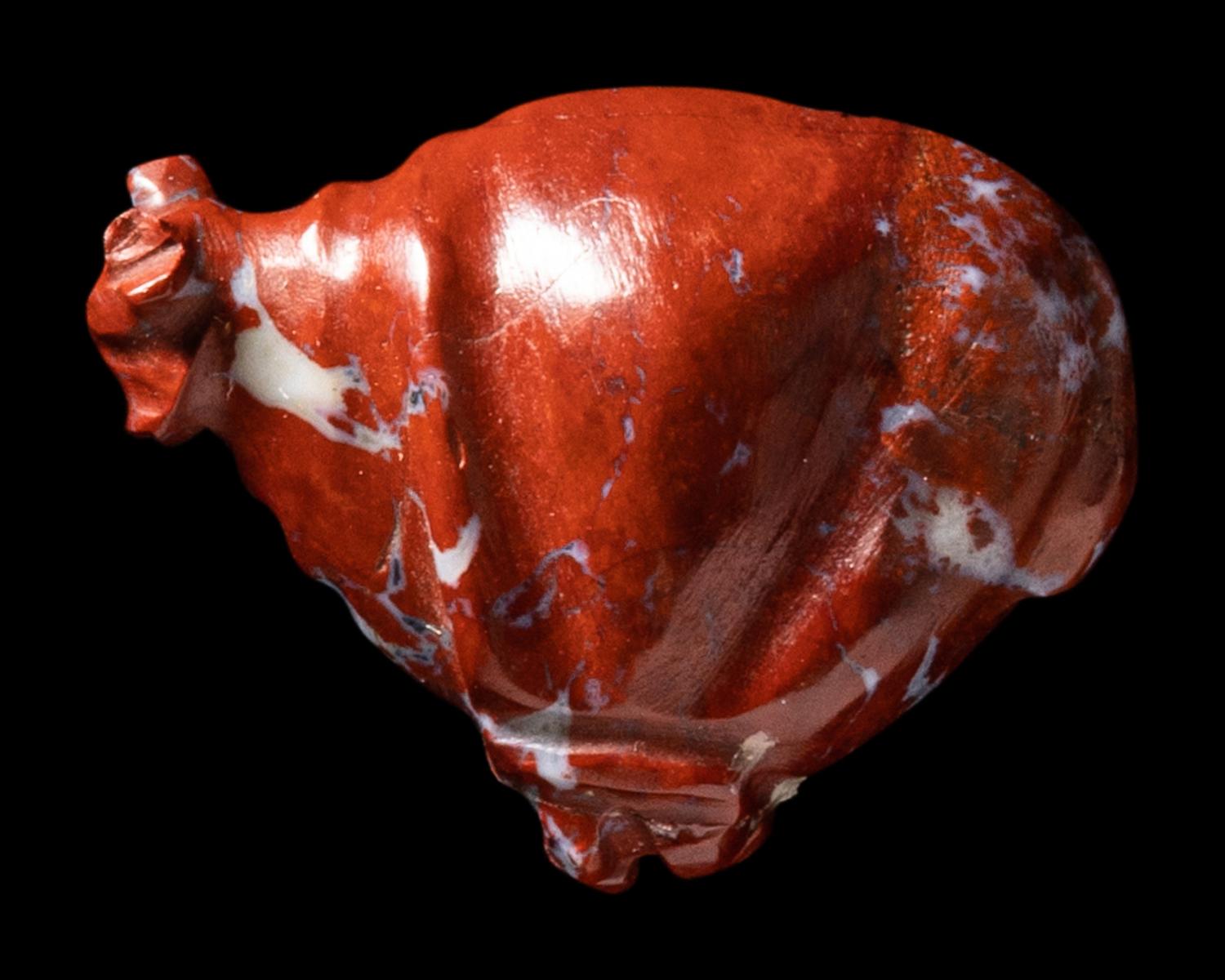 An Egyptian Red Jasper Trussed Ox