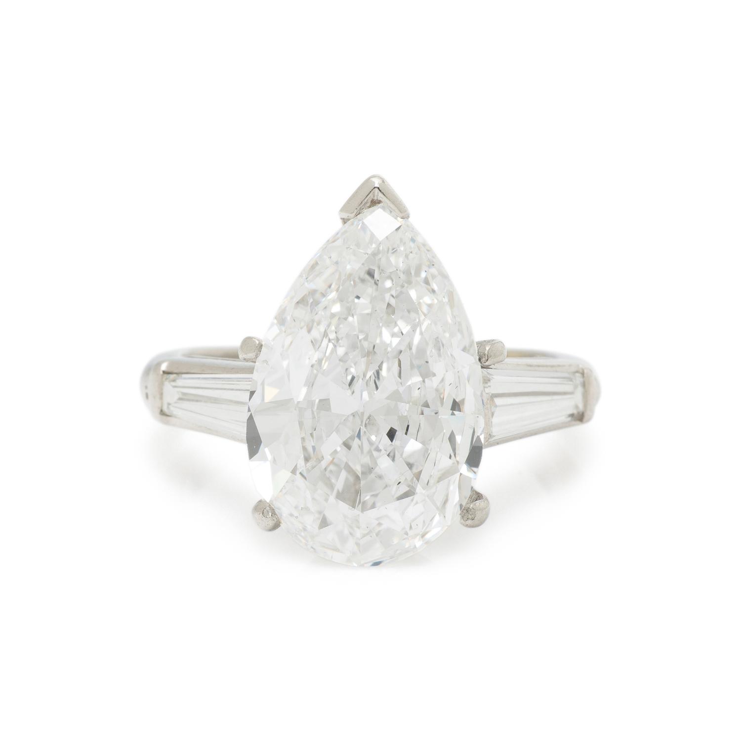 LASER DRILLED PEAR SHAPED DIAMOND AND PLATINUM RING