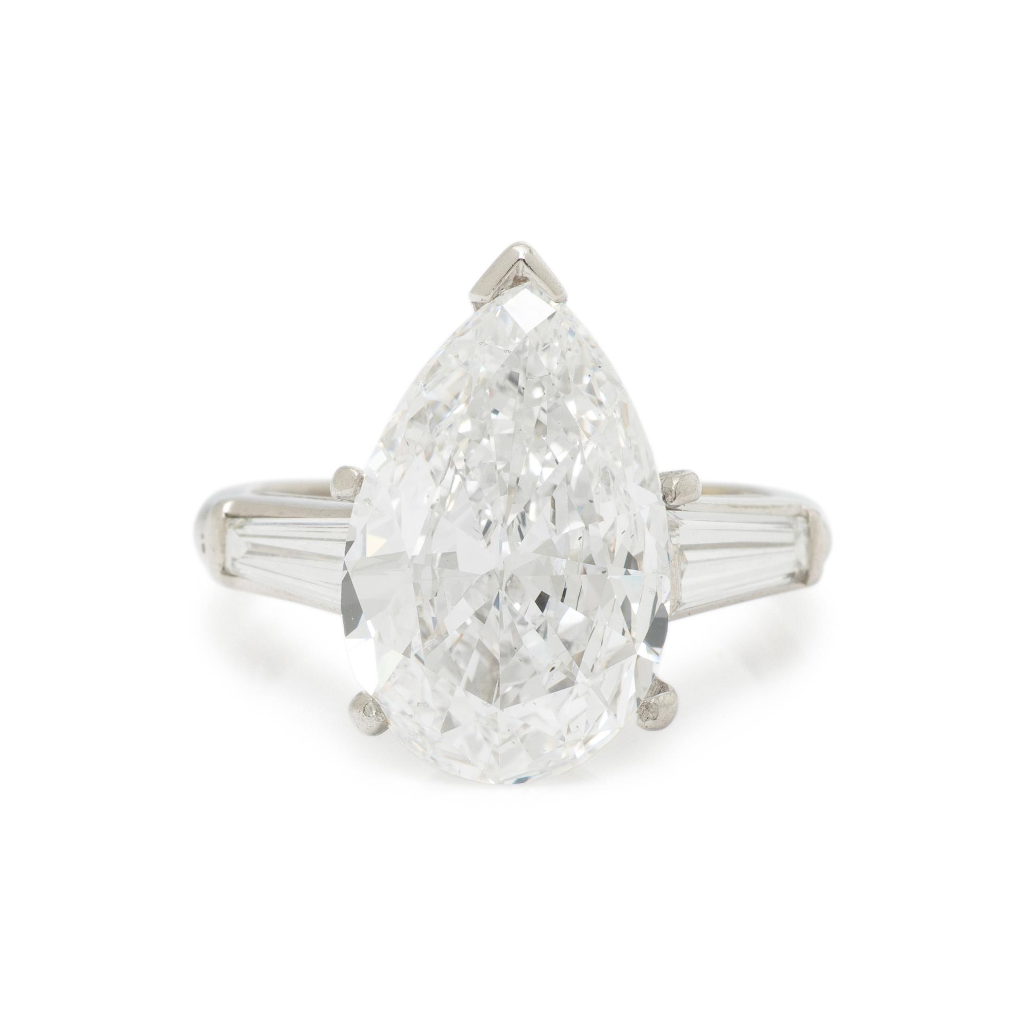 LASER DRILLED PEAR SHAPED DIAMOND AND PLATINUM RING