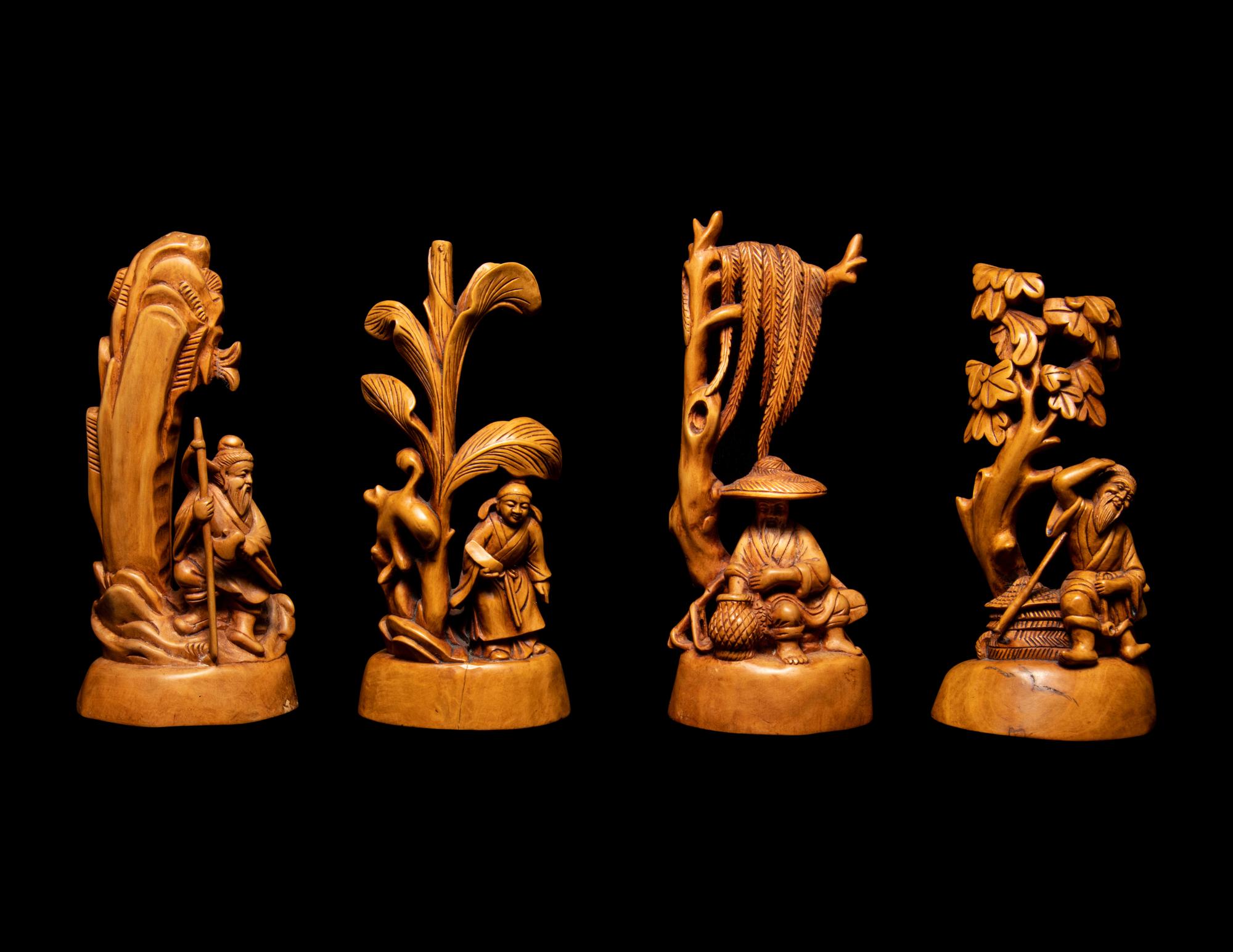 Seven Chinese Carved Hardwood Figures