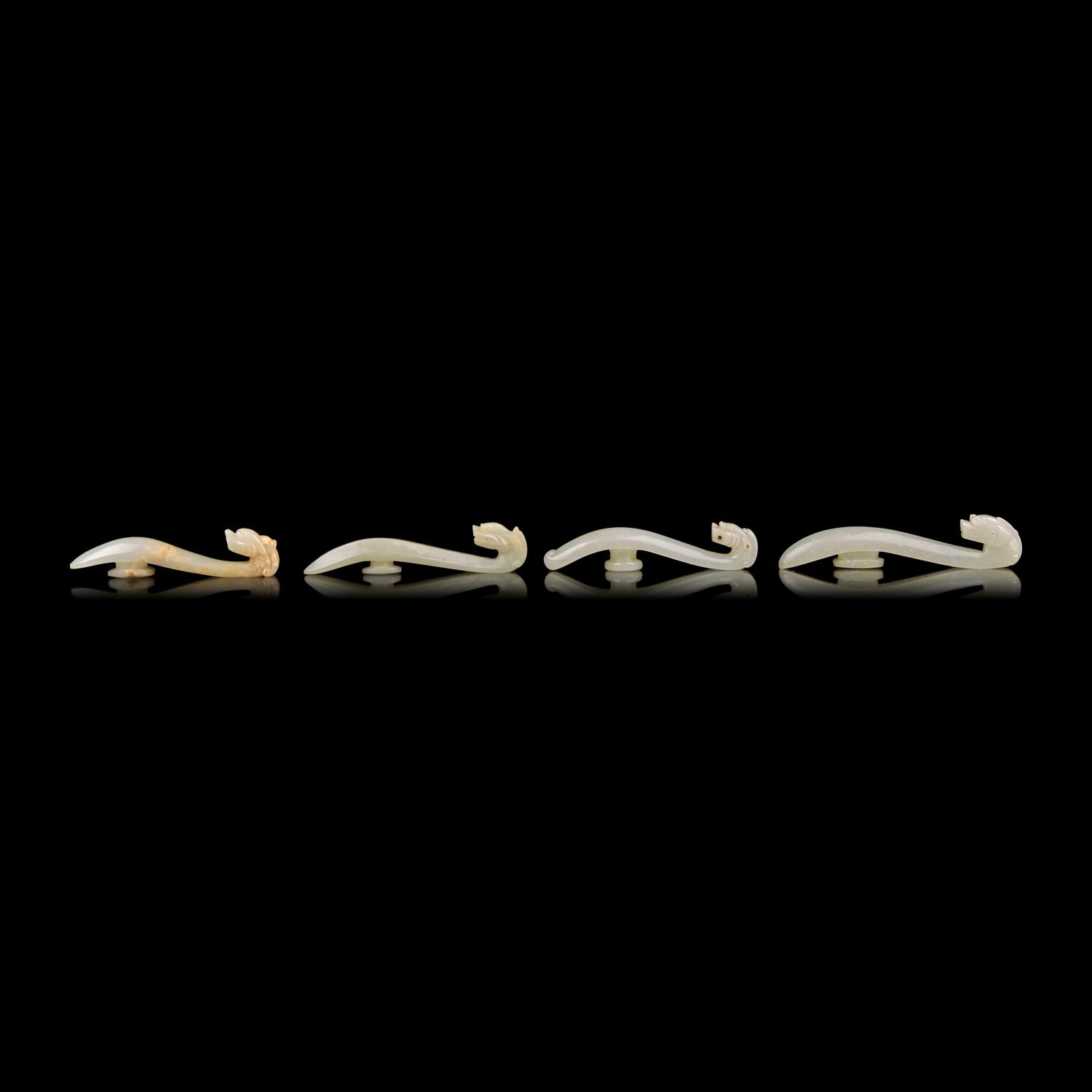 Four Pale Celadon Jade "Dragon" Belthooks, Qing Dynasty 清 青玉龍鉤四件